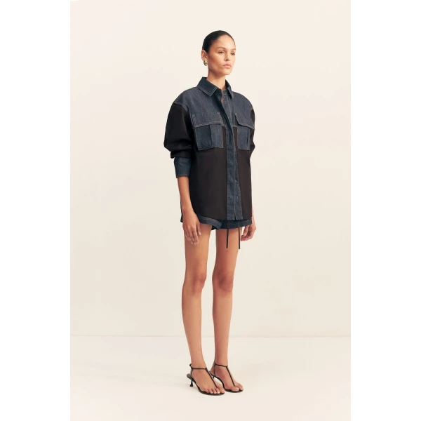 Long sleeve shirt in a dark wash denim contrasted with a black cotton poplin.