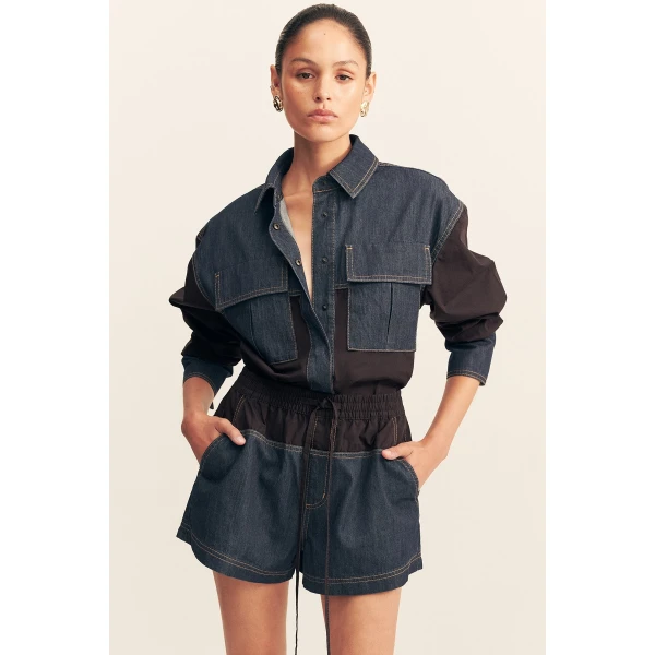 Elasticated short with drawstring in a dark wash denim contrasted with a black cotton poplin.