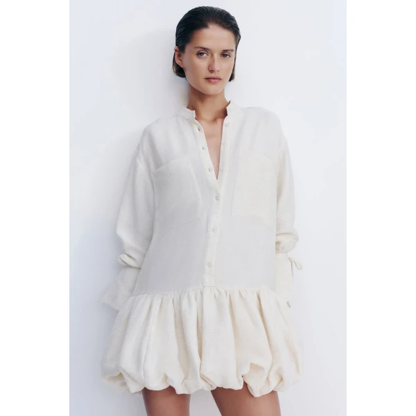 Bubble hem shirt mini dress in resin in a textured rib linen blend.