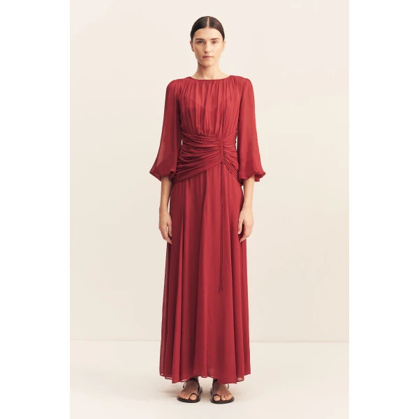 High neck balloon sleeve maxi dress in fuchsia in a semi-sheer georgette.