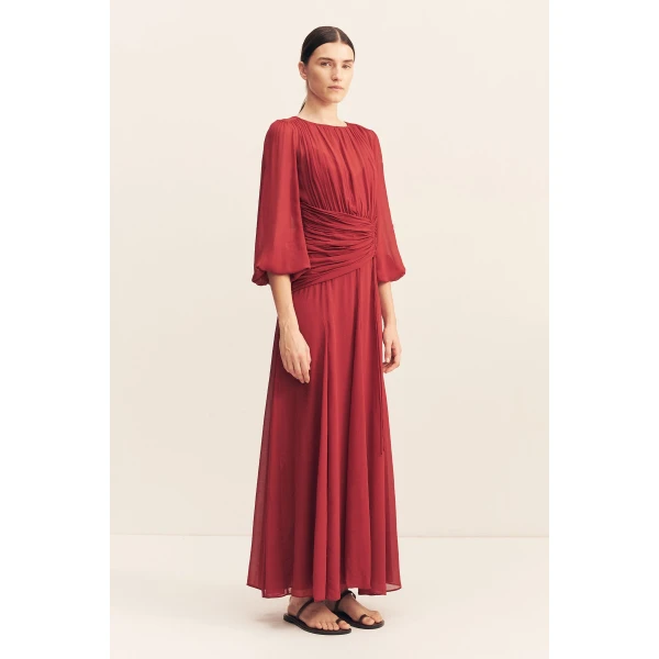 High neck balloon sleeve maxi dress in fuchsia in a semi-sheer georgette.