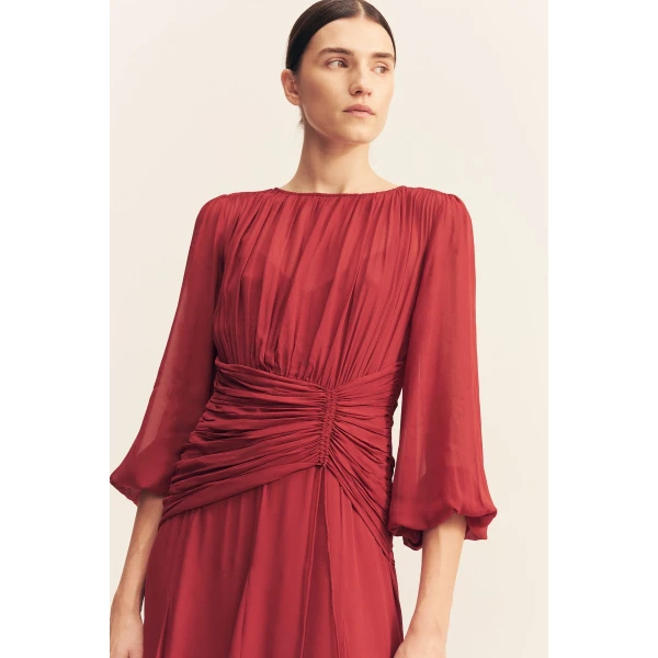 High neck balloon sleeve maxi dress in fuchsia in a semi-sheer georgette.