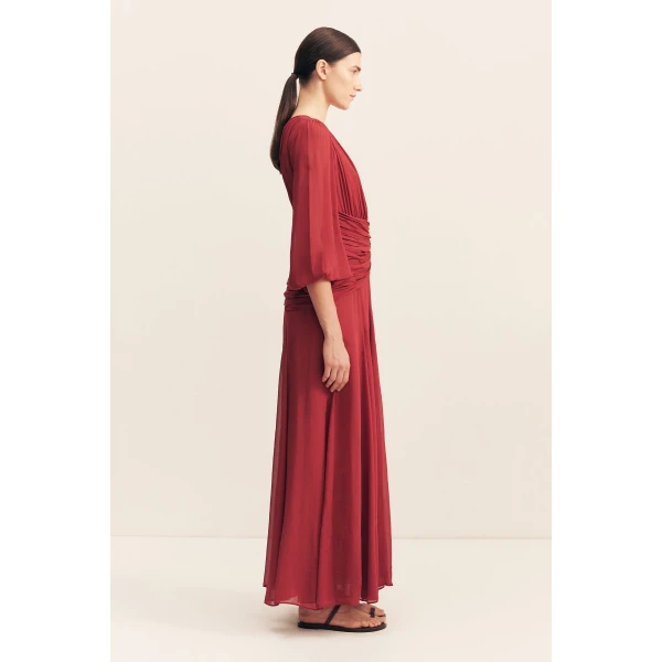 High neck balloon sleeve maxi dress in fuchsia in a semi-sheer georgette.