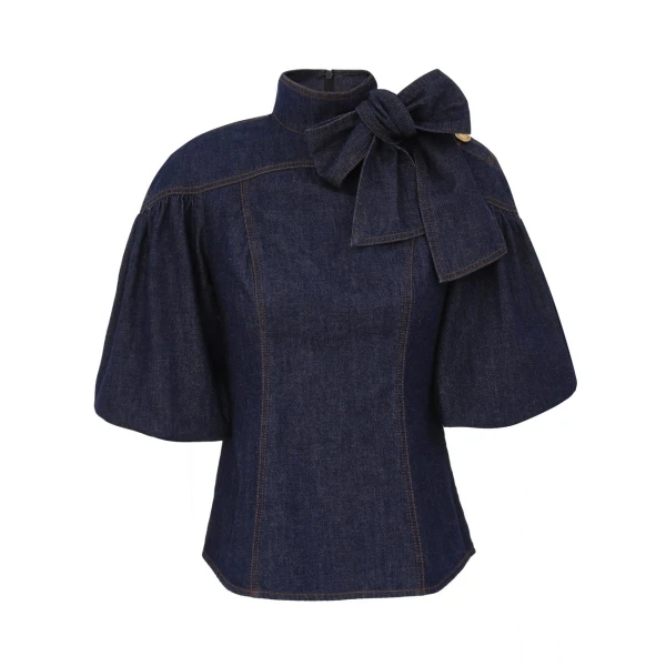 Elevate your elegance in this Zimmermann Tops   from the 2025 resort wear edit