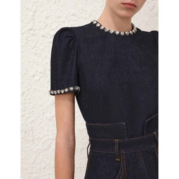 Elevate your elegance in this Zimmermann Tops   from the 2025 resort wear edit
