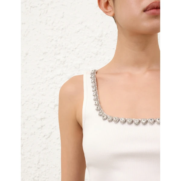 Elevate your elegance in this Zimmermann Tops   from the 2025 resort wear edit