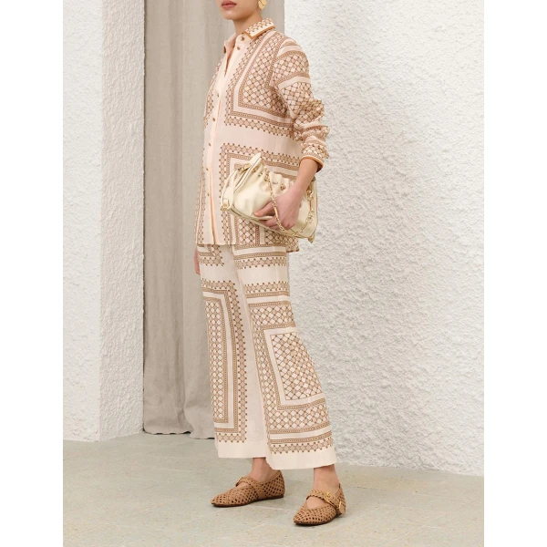 Elevate your elegance in this Zimmermann Tops   from the 2025 resort wear edit