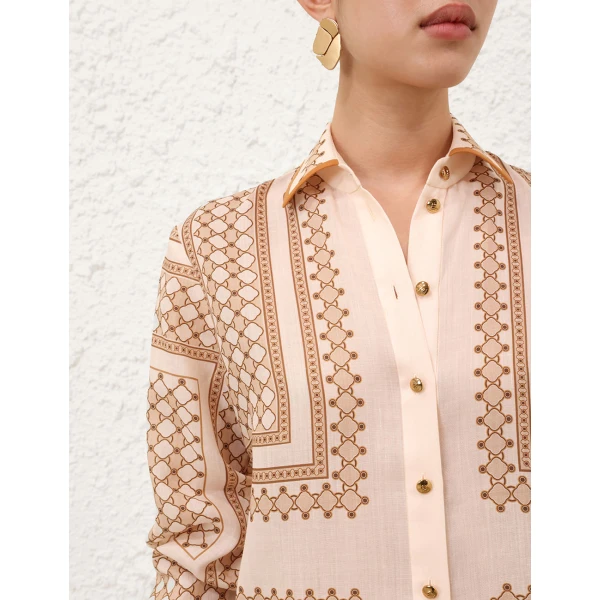 Elevate your elegance in this Zimmermann Tops   from the 2025 resort wear edit