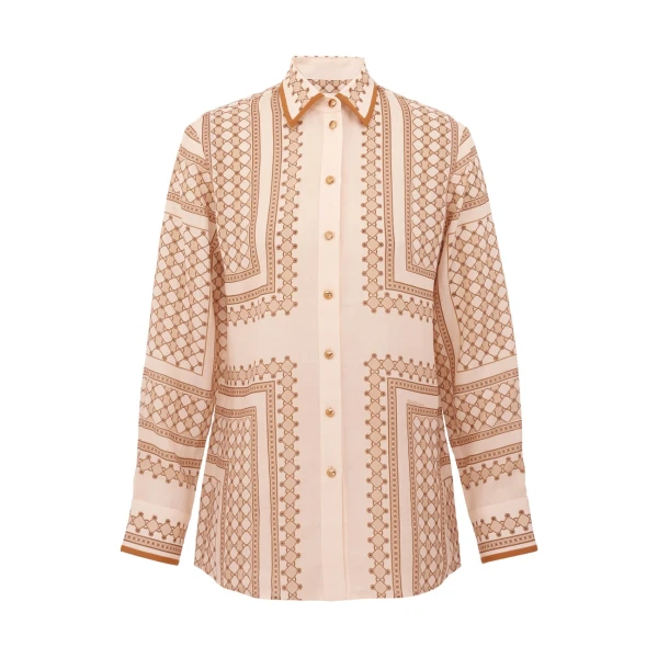 Elevate your elegance in this Zimmermann Tops   from the 2025 resort wear edit