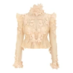 Elevate your elegance in this Zimmermann Tops   from the 2025 resort wear edit