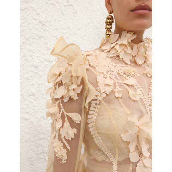 Elevate your elegance in this Zimmermann Tops   from the 2025 resort wear edit