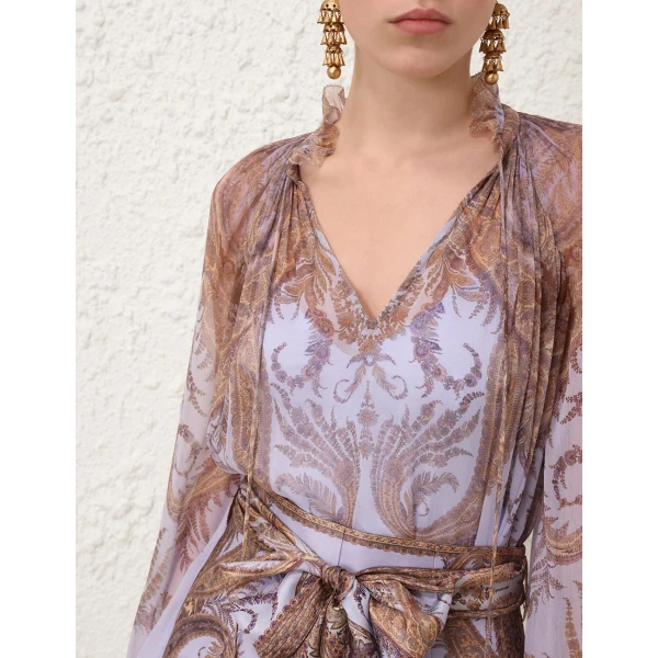Elevate your elegance in this Zimmermann Tops   from the 2025 resort wear edit