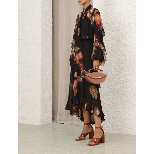 Elevate your elegance in this Zimmermann Tops   from the 2025 resort wear edit
