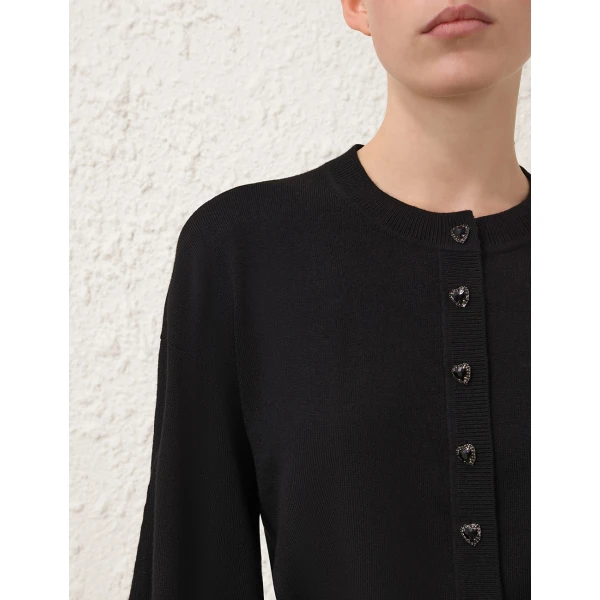 Elevate your elegance in this Zimmermann Knitwear   from the 2025 resort wear edit