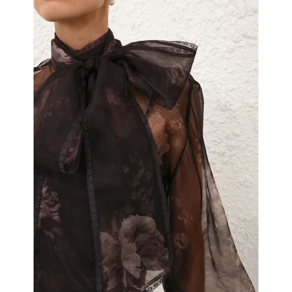 Elevate your elegance in this Zimmermann Tops   from the 2025 resort wear edit