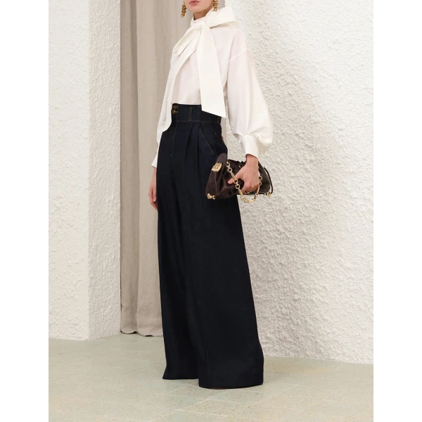 Elevate your elegance in this Zimmermann Tops   from the 2025 resort wear edit