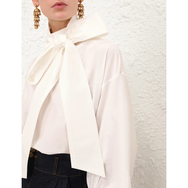 Elevate your elegance in this Zimmermann Tops   from the 2025 resort wear edit