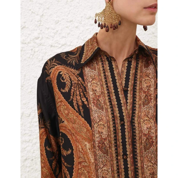 Elevate your elegance in this Zimmermann Tops   from the 2025 resort wear edit