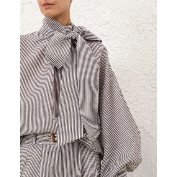 Elevate your elegance in this Zimmermann Tops   from the 2025 resort wear edit