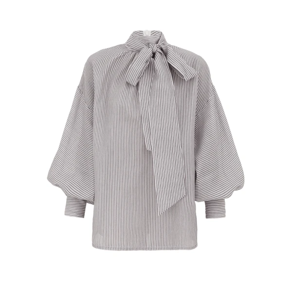 Elevate your elegance in this Zimmermann Tops   from the 2025 resort wear edit