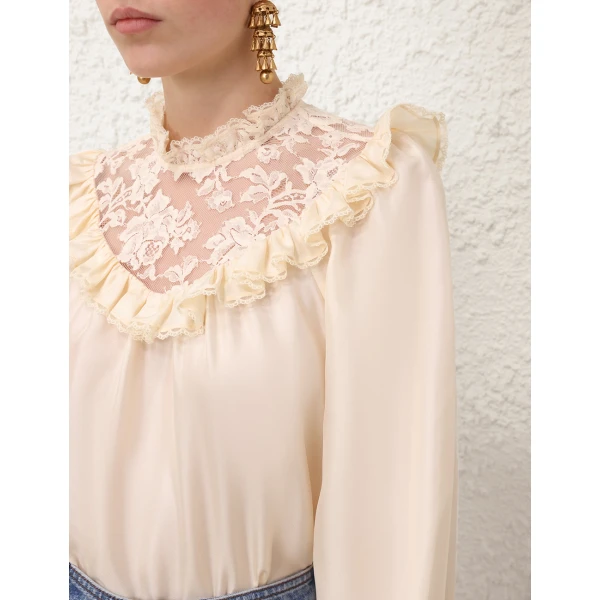 Elevate your elegance in this Zimmermann Tops   from the 2025 resort wear edit