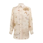 Elevate your elegance in this Zimmermann Tops   from the 2025 resort wear edit