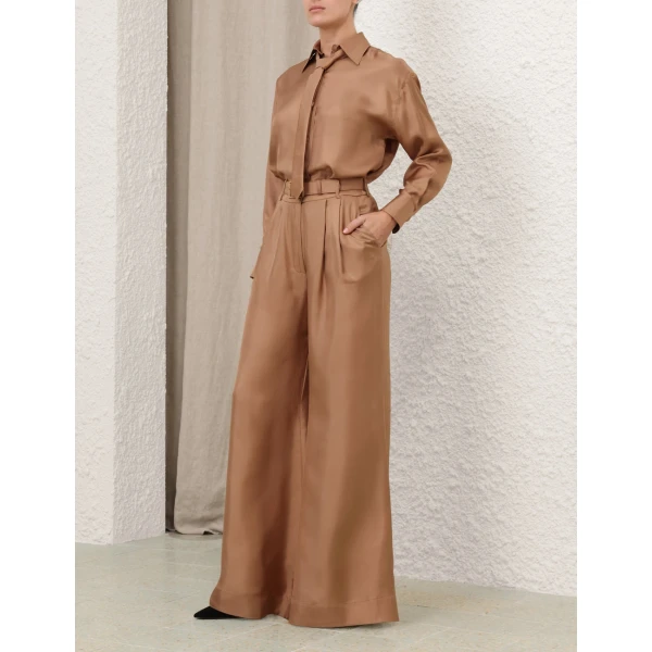 Elevate your elegance in this Zimmermann Tops   from the 2025 resort wear edit