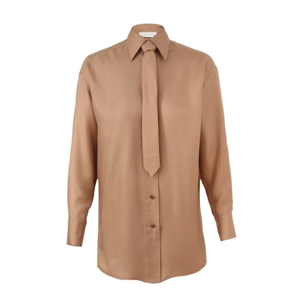 Elevate your elegance in this Zimmermann Tops   from the 2025 resort wear edit