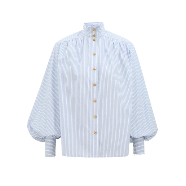 Elevate your elegance in this Zimmermann Tops   from the 2025 resort wear edit