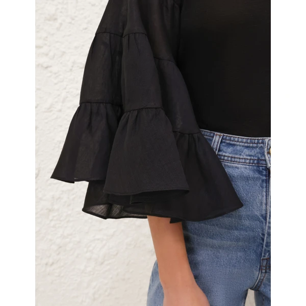 Elevate your elegance in this Zimmermann Tops   from the 2025 resort wear edit