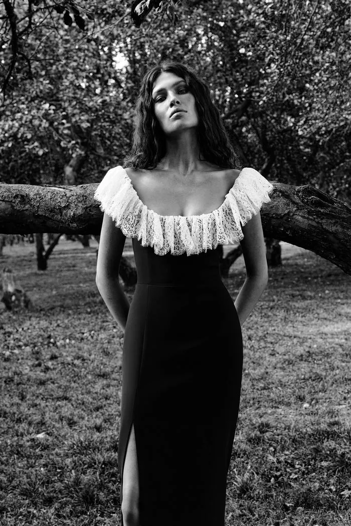 luxury black gown with white lace off shoulder neckline – coveti best dressed wedding guest