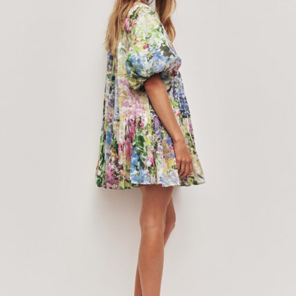 Aje Aus Dresses – structured silhouette with raw femininity from Coveti