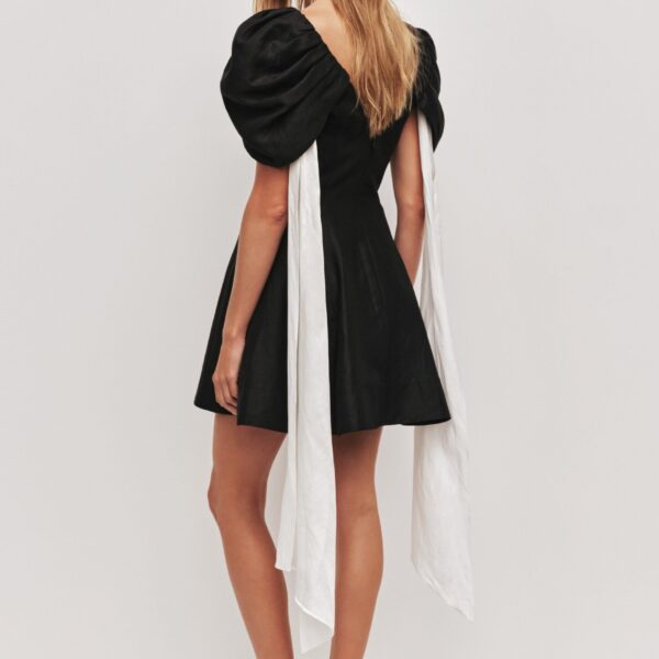 Aje Aus Dresses – structured silhouette with raw femininity from Coveti