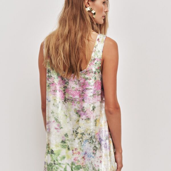 Aje Aus Dresses – structured silhouette with raw femininity from Coveti