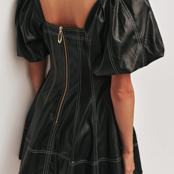 Aje Aus Dresses – structured silhouette with raw femininity from Coveti