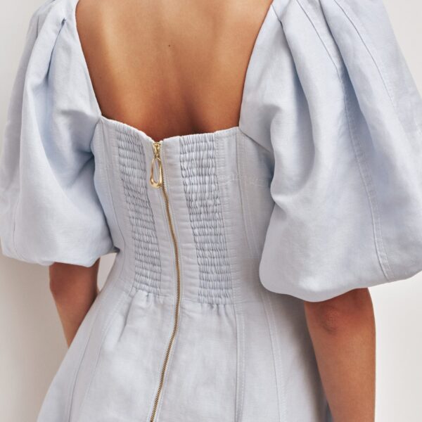 Aje Aus Dresses – structured silhouette with raw femininity from Coveti