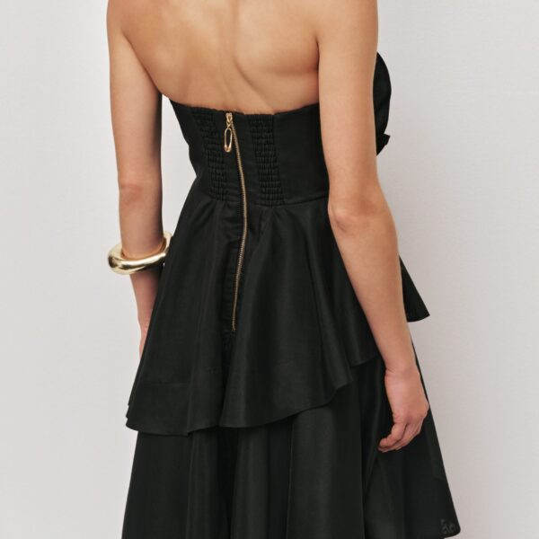 Aje Aus Dresses – structured silhouette with raw femininity from Coveti
