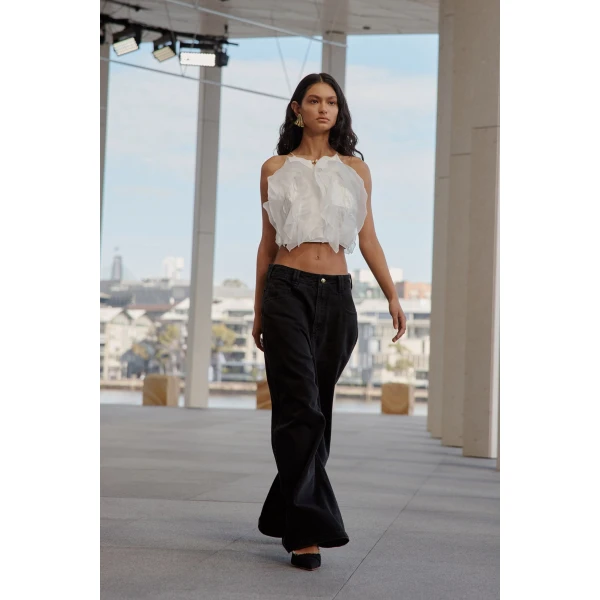 Aje clothing Aus Pants – structured silhouette with raw femininity from Coveti