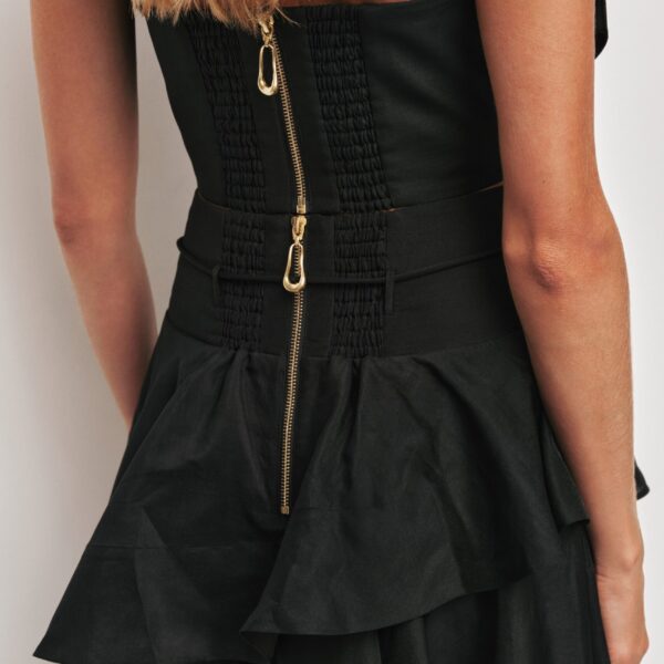 Aje Aus Skirts – structured silhouette with raw femininity from Coveti