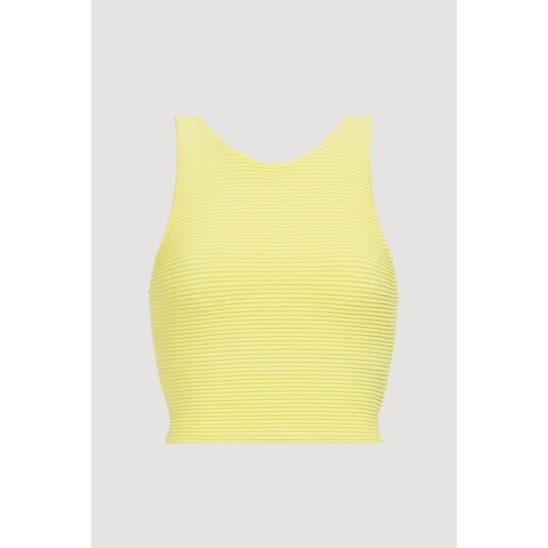 Aje Aus Tops – structured silhouette with raw femininity from Coveti