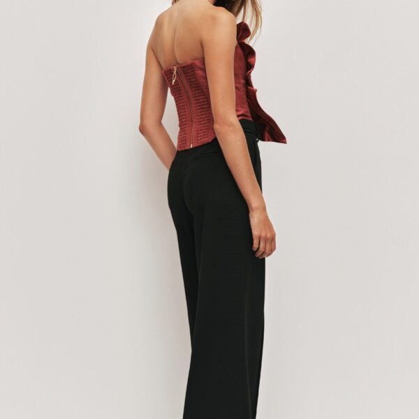 Aje Aus Tops – structured silhouette with raw femininity from Coveti