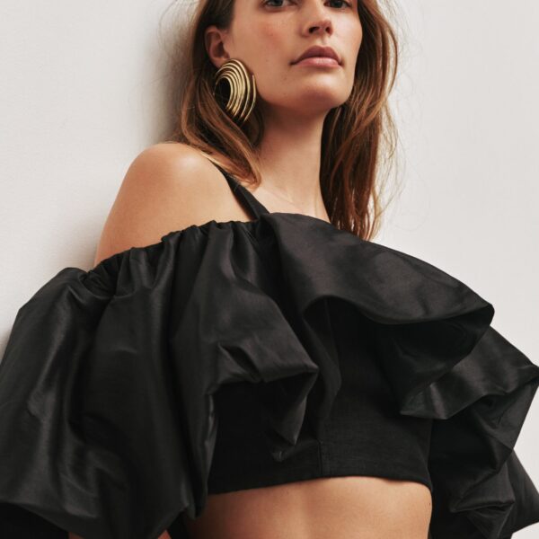 Aje Aus Tops – structured silhouette with raw femininity from Coveti