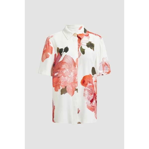 Aje Aus Tops – structured silhouette with raw femininity from Coveti