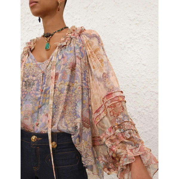 Elevate your elegance in this Zimmermann Tops   from the 2025 resort wear edit