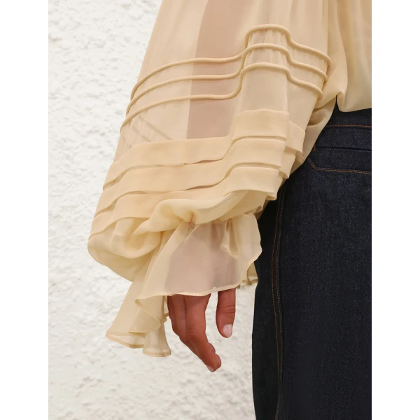 Elevate your elegance in this Zimmermann Tops   from the 2025 resort wear edit