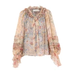 Elevate your elegance in this Zimmermann Tops   from the 2025 resort wear edit