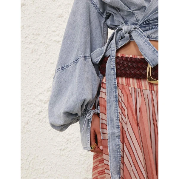Elevate your elegance in this Zimmermann Tops   from the 2025 resort wear edit