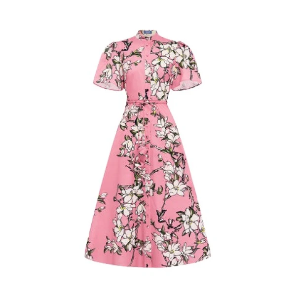 Leo Lin Pink Dresses Soft pink and ivory magnolias scattered across a gentle base. Light