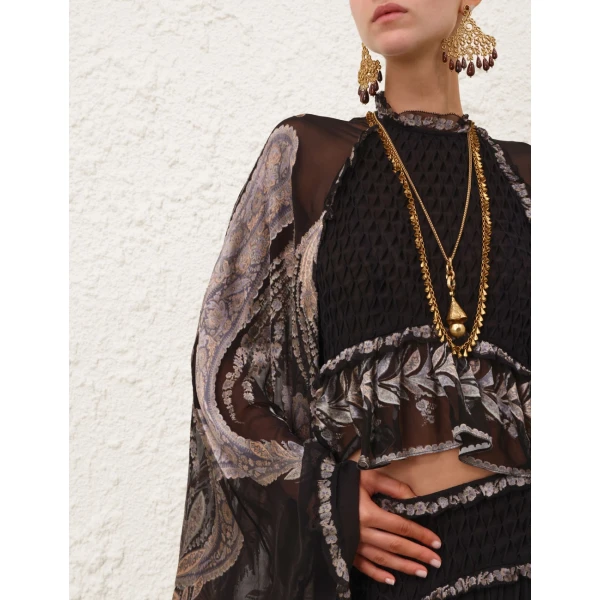 Elevate your elegance in this Zimmermann Tops   from the 2025 resort wear edit