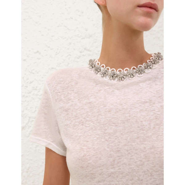 Elevate your elegance in this Zimmermann Tops   from the 2025 resort wear edit